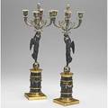 Pair of bronze candelabra patinated winged victory figures with dore decoration 19th c 20 12