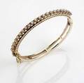 Hinged gold  diamond bracelet with enamel 14k ca 1960 twentytwo full brilliant cut diamonds approx 110 cts tw 19 gs 2 14 x 1 78