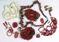 Coral jewelry twentyone pieces ca 1870present native american coral with silver beaded necklace white beach coral necklace smiling carved buddha with 14k gold back carved coral earrings with 1