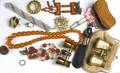 Collection of bijoux and accessories three pairs of opera glasses negress shoe horn amber and crystal necklace leopard fur and mink fur pins ceramic sautoir two art deco silver rings sterling fi