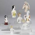 Pincushion figures seven pieces include nudes colonial and art deco figures all 20th c tallest 4 14