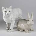 Faience porcelain white cat with glass eyes together with a rabbit 1920th c larger 23 x 11