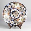 Japanese imari charger with typical blue and orange decoration with butterflies birds and other creatures 20th c 18 14