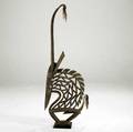 Chiwara antelope sculpture mali africa very large openwork carved wood image of an antelope in the style of a traditional headdress known as a chiwara decorated with brass elements textiles and an