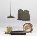 Roycroft nine pieces include pair of bookends pen tray hammered copper bowl and four ashtrays each signed together with one unidentified piece all 20th c tallest 8 38