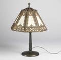 Slag glass boudoir lamp metal base with no visible signature one panel with crack 20th c ht 20 34