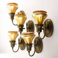 Steuben eleven shades and six sconce bases gold aurene glass and patinated metal four shades signed steuben largest shade 5 x 5 12 shade and sconce 8 12 x 4 12 x 8