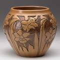 Lorene mennie jasper north dakota school of mines vessel carved with daffodils brown glaze 1944 provenance the artists collection signed and dated circular indigo stamp 5 12 x 6 14