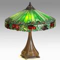 Handel table lamp red rose pattern bronze and leaded slag glass base and shade marked handel shade 7 x 20 overall 22 12 x 20