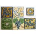 Grueby six assorted tiles three stamped grueby boston largest 6 sq