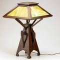 Prairie school oak table lamp with tapering buttressed base and slag glass shade unmarked 22 12 x 15 sq