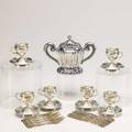 Continental silver twentyfour pieces set of six spun silver demitasse cups and saucers with engraved vacant cartouche fluted twohandled covered sugar bowl partial fruit service for six with figu