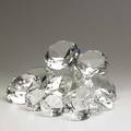 Swarovskiattr fourteen crystal diamond paperweights seven large and seven smaller unmarked larger 4 34 dia