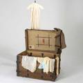 Antique childrens clothes etc approx seventy pieces 19th20th c silk homespun linen etc in steamer trunk largest 48 x 48