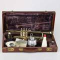Olds  son mendez trumpet model n 10 serial 421438 lot 6310 in original hard case with olds 3 mouthpiece vincent bach mouthpiece along with three mutes one wowwow ca 1955