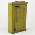 Folk art painted wallhanging cabinet with decorative crown and door hand carved latch 44 12 x 29 x 11