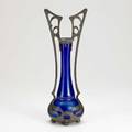 Art nouveau bohemian glass vase cased in a white metal grate unmarked 15 34 x 5 14 x 4 38