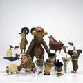 Danish modern figures etc approx twentytwo pieces most teak large monkey two lions viking etc tallest 17