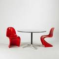 Verner panton and charles  ray eames three pieces dining table and side chairs 1960s70s chairs painted fiberglass and table laminate rubber and polished aluminum chairs inscribed and table h
