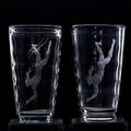 Vicky lindstrand orrefors pair of glass vases decorated with nude swimmers both marked each 11 12 x 6 14 dia