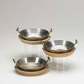 Karl aubock three stainless steel and brass serving dishes with wooden chargers unmarked each2 14 x 6 14 dia