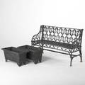 Garden furniture three pieces 20th c gothic style bench together with a pair of footed planters bench 33 12 x 55 12 x 19