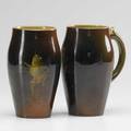 Rookwood pair of standard glaze handled mugs with dancing frogs 20th c marked 6