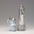 Mary gregory clear glass stein with enameled decoration ca 1900 together with a porcelain stein st nicholas society dated 1900 taller 15 34