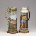 Mettlach two steins early 20th c no 2691 etched two litre and no 2796 two litre lid damage to latter taller 16 34