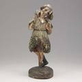 Continental carved wood figure depicting a hunter carrying game with polychrome decoration possibly italian 18th c losses 18