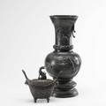 Two asian bronzes floor vase with birds in high relief and a footed incense burner depicting a kirin 19th20th c taller 20 14
