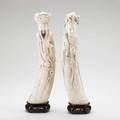 Chinese ivory figures of an emperor and empress both with carved dragon decoration on wood bases 19th20th c glue repair to crown of emperor both marked taller 16