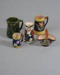 A Collection Three Pitchers A Toby  A Basket