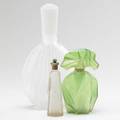 Ruba rombic etc green rombic perfume bottle together with deco store perfume display and lander narcissus atomizer 20th c tallest 13