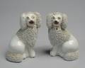 Pair of Seated Staffordshire Poodles