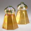 Tiffany studios pair of gold favrile glass shades green leaves provenance baltimore museum of art to benefit future acquisitions unmarked 8 12 x 6 14 8 34 x 6 14