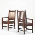 Roycroft pair of armchairs mahogany leather brass tacks unusual offcenter carved orb and cross marks 43 34 x 21 x 22 12