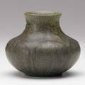 Grueby squat vase with yellow blossoms very dark green glaze provenance merson collection baltimore museum of art to benefit future acquisitions circular pottery stamp 4 12 x 5 14