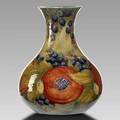 Moorcroft early green pomegranate vase glazed signature and made for liberty  co 7 12 x 5 12