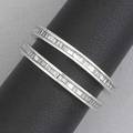 Two diamond eternity bands baguette cut diamonds approx 140 cts tw channelset in 18k wg 36 gs gw size 6