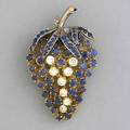Grape cluster diamond and sapphire broochpendant diamonds approx 15 cts tw sapphires approx 3 cts tw in 14k yg leavesstem in 14k wg 172 gs gw 1 78 x 1 14