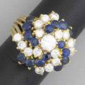 Sapphire and diamond cocktail ring spiral bombe set with approx 95 ct tw diamonds 80 ct tw sapphires in 18k yg ca 1965 103 gs size 5 12