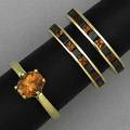 Mandarin garnet rings claw set oval solitaire and two channel set bands of alternating square cut onyx and orange garnets one band set 360 degree one band set 180 degree around circle all 18k yg