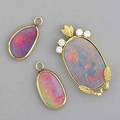 Boulder opal and gold jewelry pendant with 290 cts opal and 50 ct tw diamonds in 18k 1 38 pair of gold framed opal earring pendants in 14k 58 95 gs gw