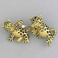 Gold and diamond leopard brooch two playful leopards with enamel spots and emerald eyes in 18k yg holding a diamond approx 15 ct 206 gs gw 2 x 1