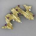 Gold diamond and ruby modernist brooch diamonds 22 ct tw and rubies 70 ct tw on texturized 14k yg 198 gs gw 1 12 x 2 12