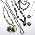 Assorted jewelry ten pieces patrice egyptian style necklace and earring set brian kerkuliet crystal bead on silver chain necklace with glass beads on copper chain by unknown artist pair of kennet