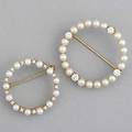 Pearl and diamond circular brooches ca 1920 two brooches larger brooch diamonds approx 50 ct tw and 4mm pearls 1 38 smaller brooch diamonds approx 40 ct tw and 3mm pearls 1 18 bo