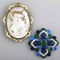 Two brooches cameo depicting a lion hunter on a horse in 9k marked jm 271 gs gw 3 x 2 38 blue and green paste gem brooch marked eisenberg 2 14