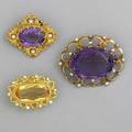 Ornate amethyst or citrine gold brooches ca 1900 three brooches amethyst and seed pearls in 14k yg 1 12 amethyst and seed pearls in 10k yg 1 18 citrine and seed pearls in 14k yg 1 18